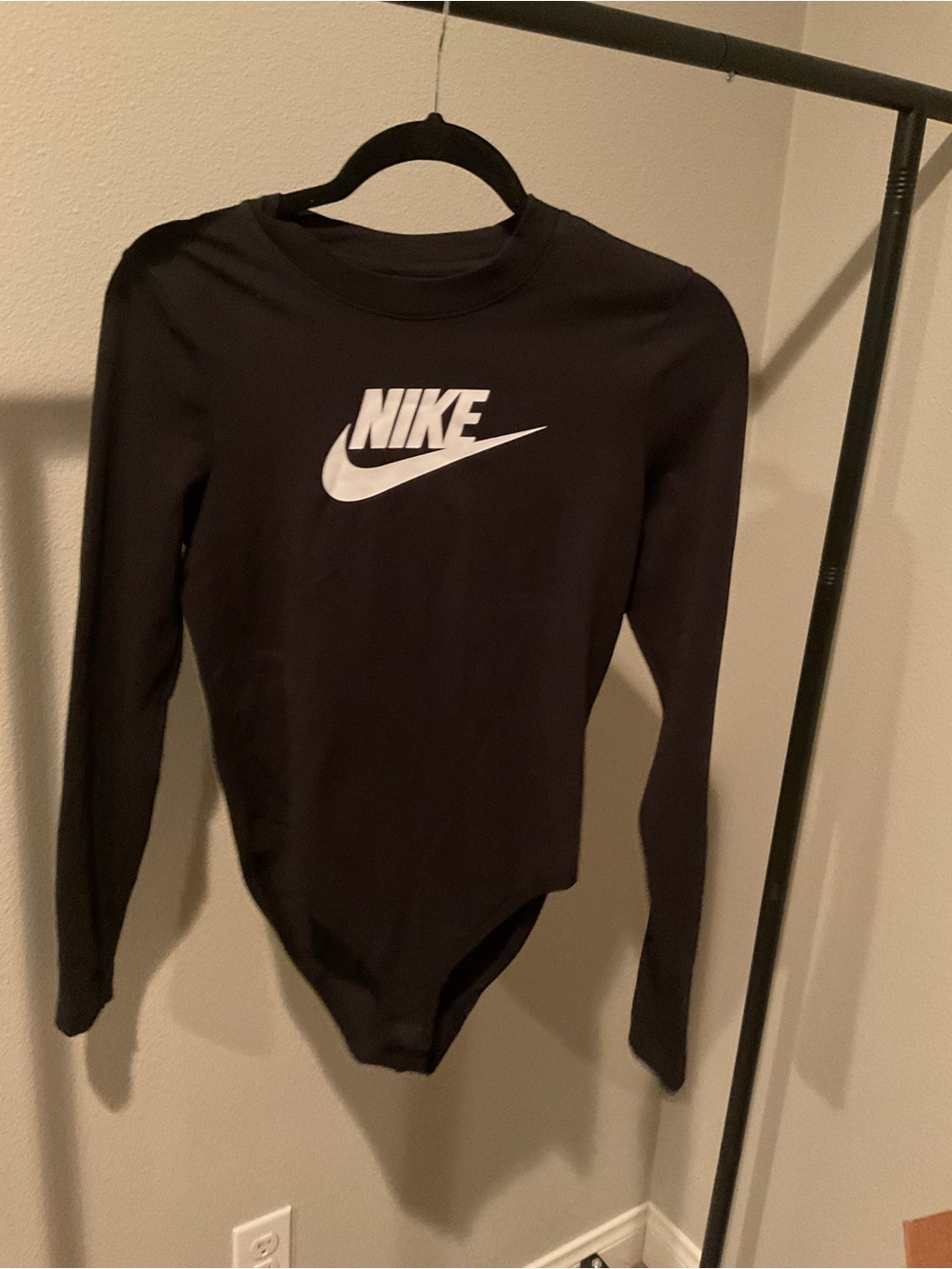 Nike Black Long-Sleeve Bodysuit with White Swoosh Logo